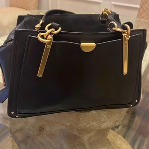 Coach Dreamer cross body bag,  black and gold